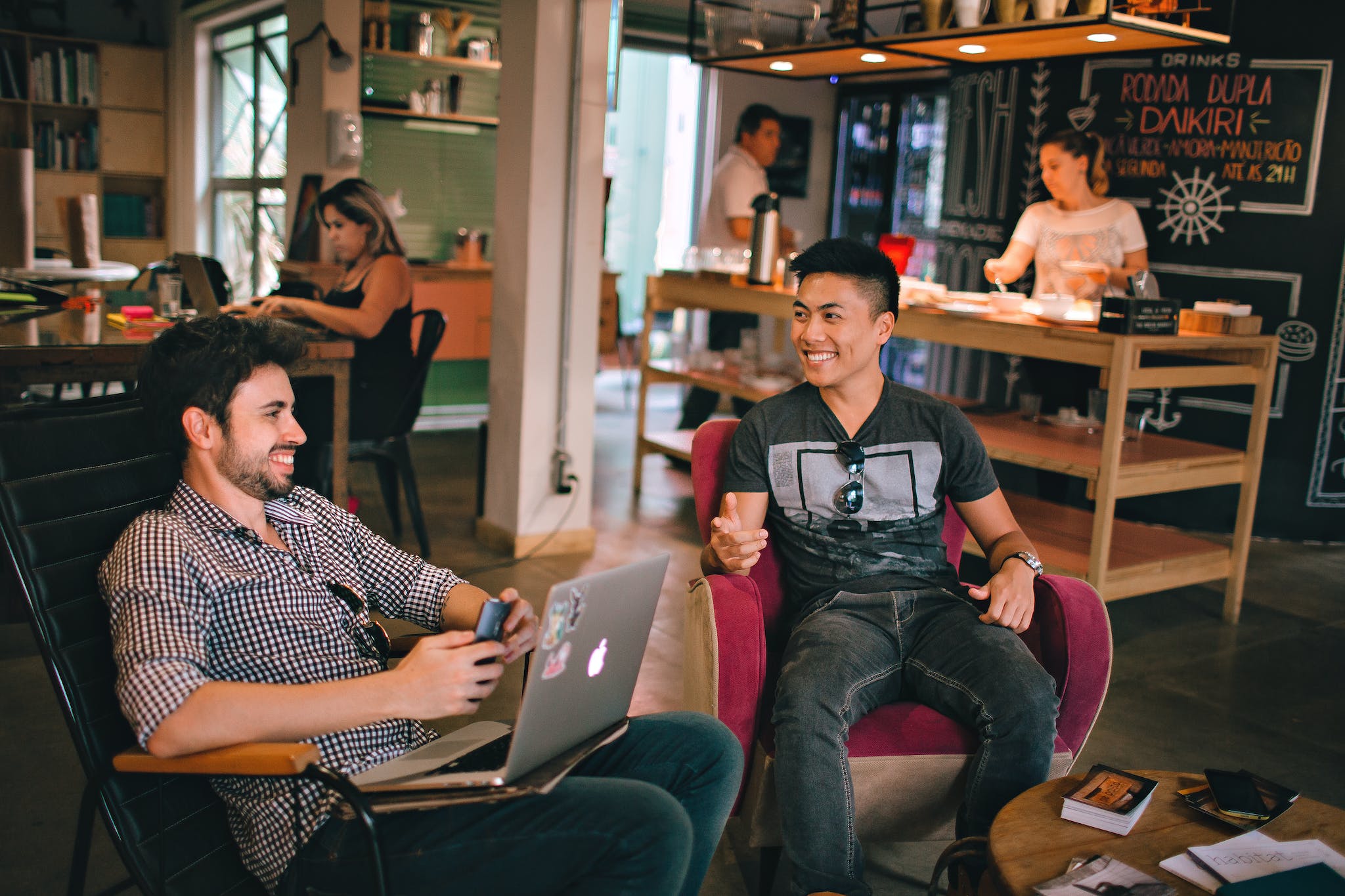 software implementation - photograph-of-men-having-conversation-seating-on-GVO-goVirtualOffice