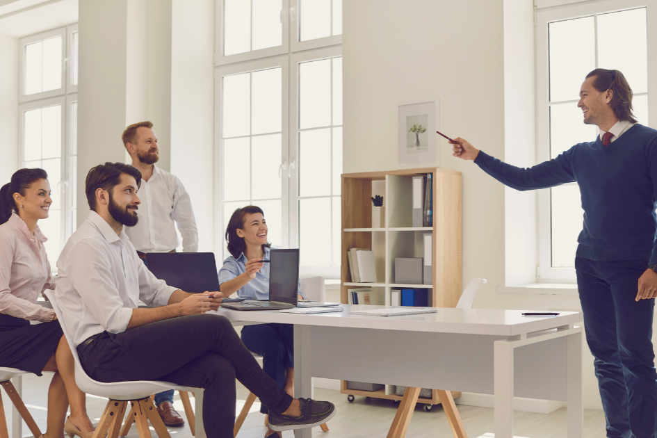 Manufacturing team evaluating ERP solutions in a modern office setting.