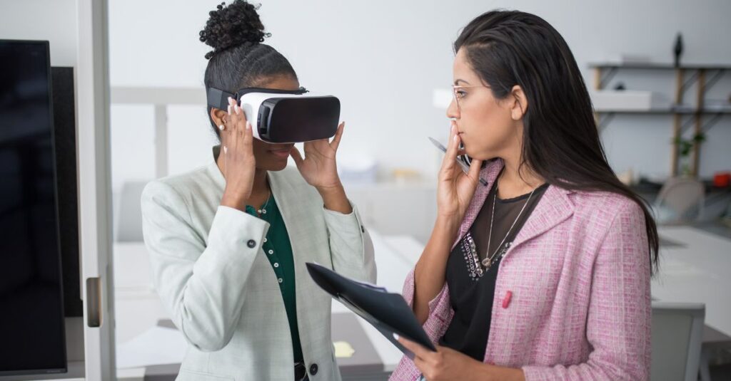 Two professional women collaborating using VR technology in a modern office setting, showcasing innovation.