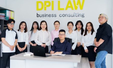A diverse group of professionals in a business consulting office setting.